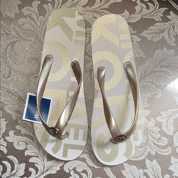 Michael Kors Gold Flip-Flop Sandals - Picture 1 of 2